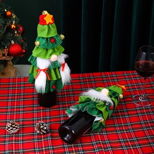 Gnome-style Christmas wine bottle covers with green forest motifs on a festive table