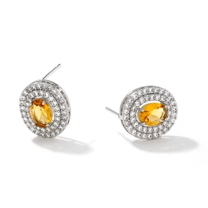 Elegante silberne Ohrstecker mit ovalem gelbem Edelstein und doppeltem Zirkonia-Heiligenschein