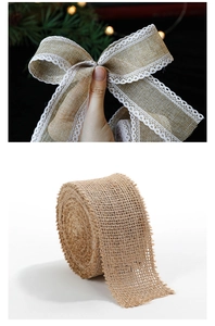 Close-up of natural burlap ribbon with lace edges for festive Christmas decorations