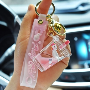 Pink liquid quicksand unicorn milk tea cup keychain with glitter and Pretty Girl wrist strap