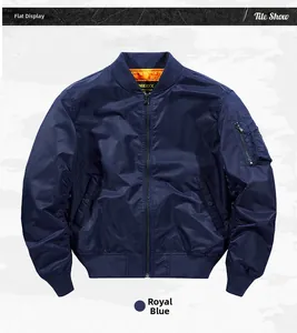 Detail of royal blue bomber jacket with orange lining and utility arm pocket