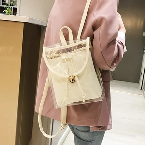 Transparent PVC backpack with cream inner drawstring pouch and golden rotating lock for women