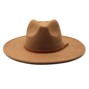 Detailed view of camel wool fedora hat featuring a thin brown leather band with rivets