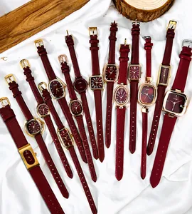 Détails de montres GEDI avec bracelet en cuir bordeaux et boîtiers dorés géométriques