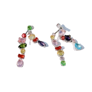 Colorful Gema crystal drop earrings with multi-shaped rainbow gemstones in silver setting