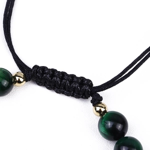 Detail of adjustable black woven cord on a green tiger eye stone beaded bracelet