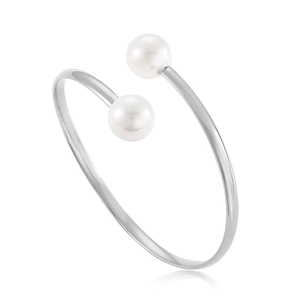 Minimalist stainless steel open bangle featuring dual white pearls on a polished silver band