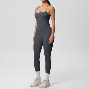 Detail shot of seamless high waist charcoal yoga leggings and thin strap sports bra