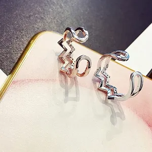 Minimalist geometric double-layered gold and silver ear cuffs with micro-pave crystals