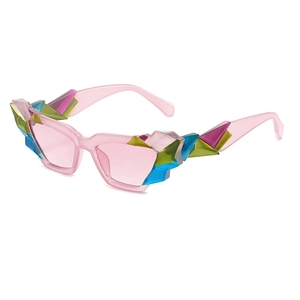 Pink translucent cat-eye sunglasses with colorful geometric crystal embellishments