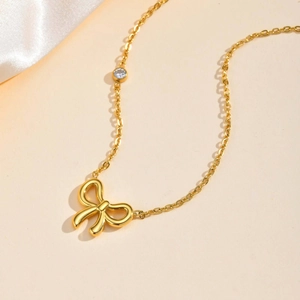 Elegante goldene Edelstahl-Schleifenkette für Damen mit funkelndem Zirkonia-Anhänger