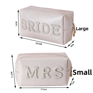 Detail view of pearl-embellished BRIDE and MRS makeup bags with specific dimensions