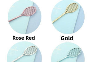 Close-up of badminton racket pens in metallic rose gold, gold, silver, and light blue colors