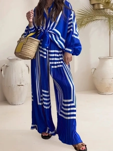Blue and white geometric striped pleated two-piece set with shirt and wide-leg pants