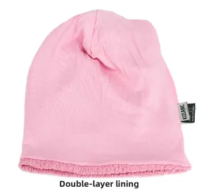 Detail showing the pink knit beanie with a double-layer lining and brand logo label
