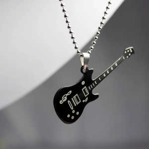 Modern black electric guitar pendant necklace with silver music notes on a bead chain
