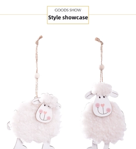 Detail view of Easter lamb pendants featuring white faux wool and natural wood with jute rope