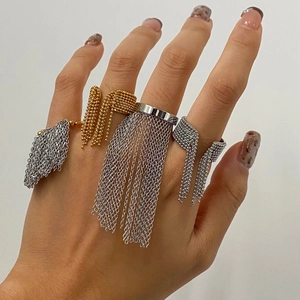 Elegant 18k gold and silver stainless steel rings with hanging chain tassel detail