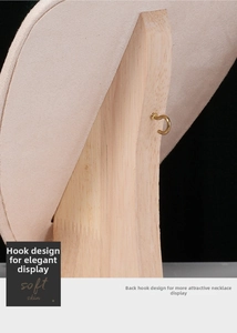Detail of wooden necklace stand back showing soft velvet finish and gold metal hook