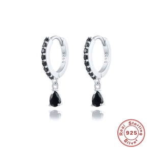 Detailed macro view of S925 sterling silver earrings with black teardrop crystal charms