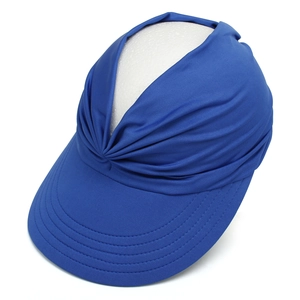 Detail of navy blue sun visor with twisted front knot and wide stitched brim