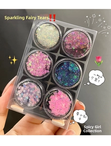 Close-up of a 6-color glitter gel palette featuring star shapes and sponge brushes