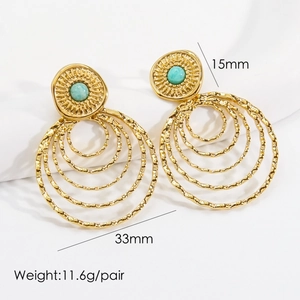 Detail of bohemian gold earrings with turquoise stone and dimensions 15mm/33mm