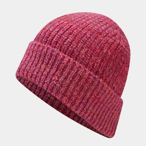 Detailed close-up showing thick ribbed knit texture of rose red and purple winter beanie