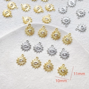 Detail of 14k gold plated evil eye charms with cubic zirconia for DIY jewelry making