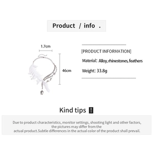 Detailed view of feather and rhinestone necklace with specs 33.8g and 46cm length
