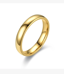 Detailed view of a 4mm gold polished stainless steel ring with a smooth mirror finish