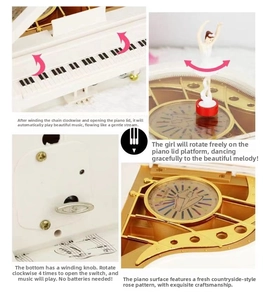 Detail of mechanical piano music box with rotating ballerina and pink floral patterns