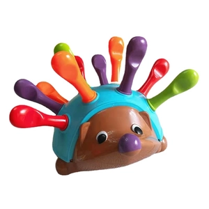 Educational hedgehog toy for toddlers with colorful pegs to improve motor skills