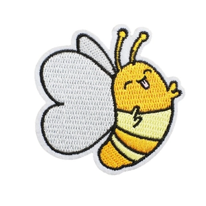 Detailed cartoon bee embroidered patch on white background for clothing decoration
