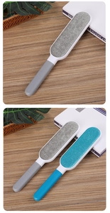 Manual lint remover brushes in grey and blue for clothes and household fabric cleaning