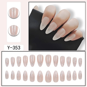 Almond press-on nails with nude pink base and silver flame French line design