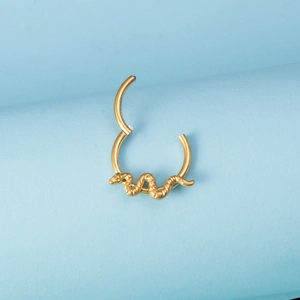 Detailed view of a gold snake-shaped piercing hoop with a seamless hinged closure