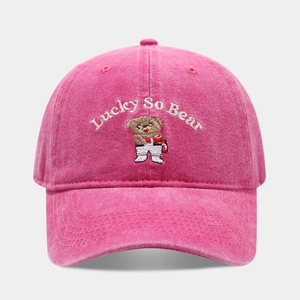 Detail of rose red washed cotton baseball cap with bear and Lucky So Bear embroidery