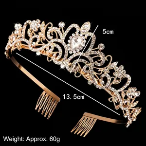 Exotic golden bridal tiara with sparkling rhinestones and drop-shaped crystal for party