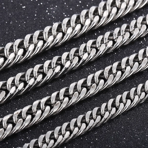 Macro detail of polished silver stainless steel curb chain links for men jewelry