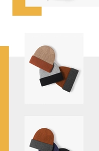 Detail of color-block knit beanies showing thick jacquard texture and cuffed design