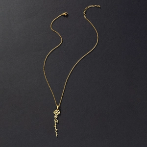 Macro view of gold-plated stainless steel Sophia pendant with refined O-chain detail
