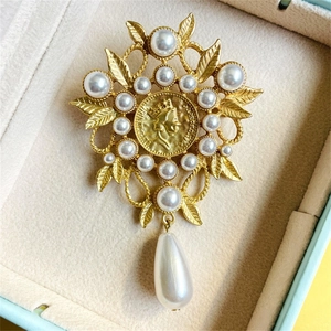 Vintage matte gold queen coin brooch with pearls and water drop pendant in a gift box