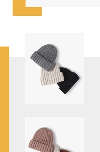 Multi-color rib-knit beanies in grey, beige, black, and pink with folded cuff design