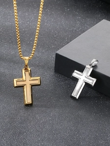 Détail des pendentifs croix en acier inoxydable or 18 carats et argent polis et brillants