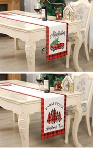 Detailed view of Christmas table runner with red black plaid and festive prints