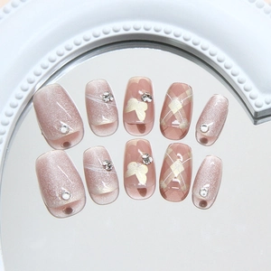 Sparkling gold butterfly and cat-eye nail art set with diamonds and plaid patterns