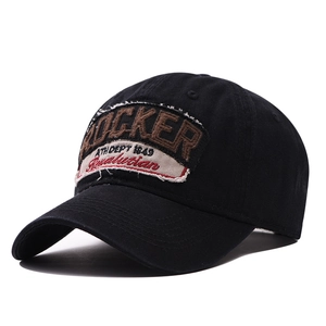 Casquette trucker noire vintage avec broderie Rocker et large bord de style rétro