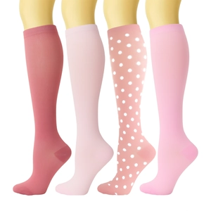 Detail of pink compression socks and polka dot pattern shown on models for sports