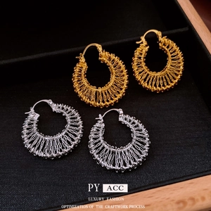 Gold and silver woven round hoop earrings with hollow metal wire mesh design